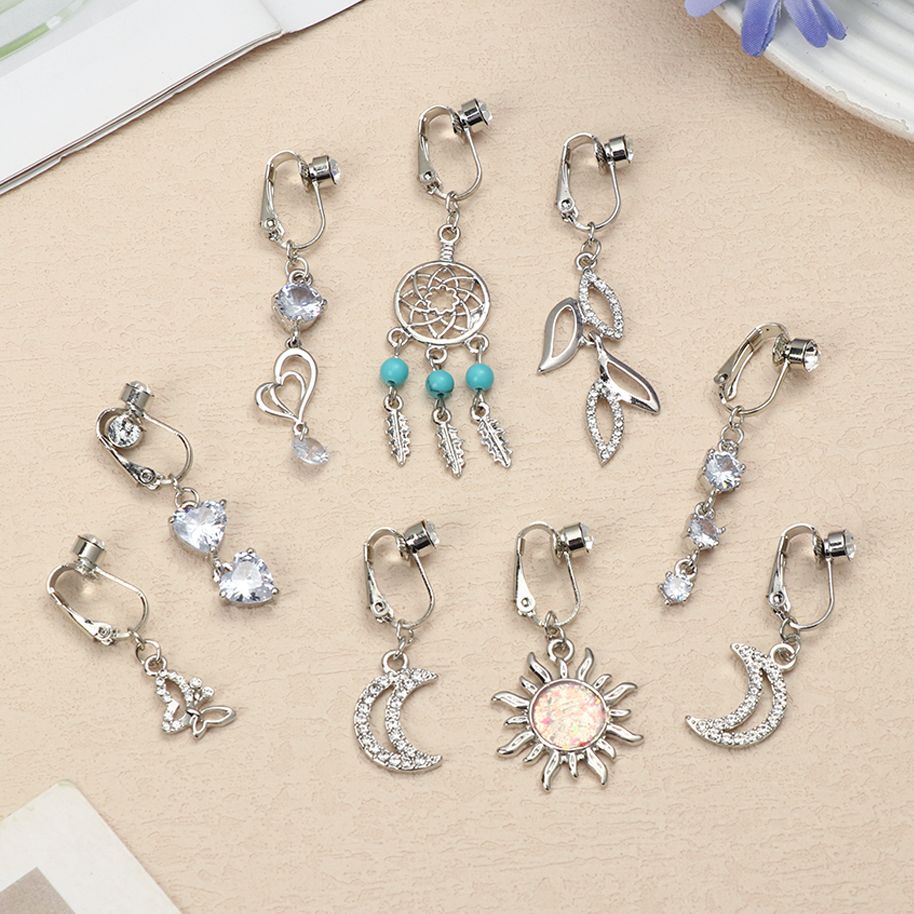 Faux Fake Belly Star Fake Bell - Moon Star Earrings recension och pris